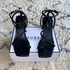 Black Guess Heels a size 7.5